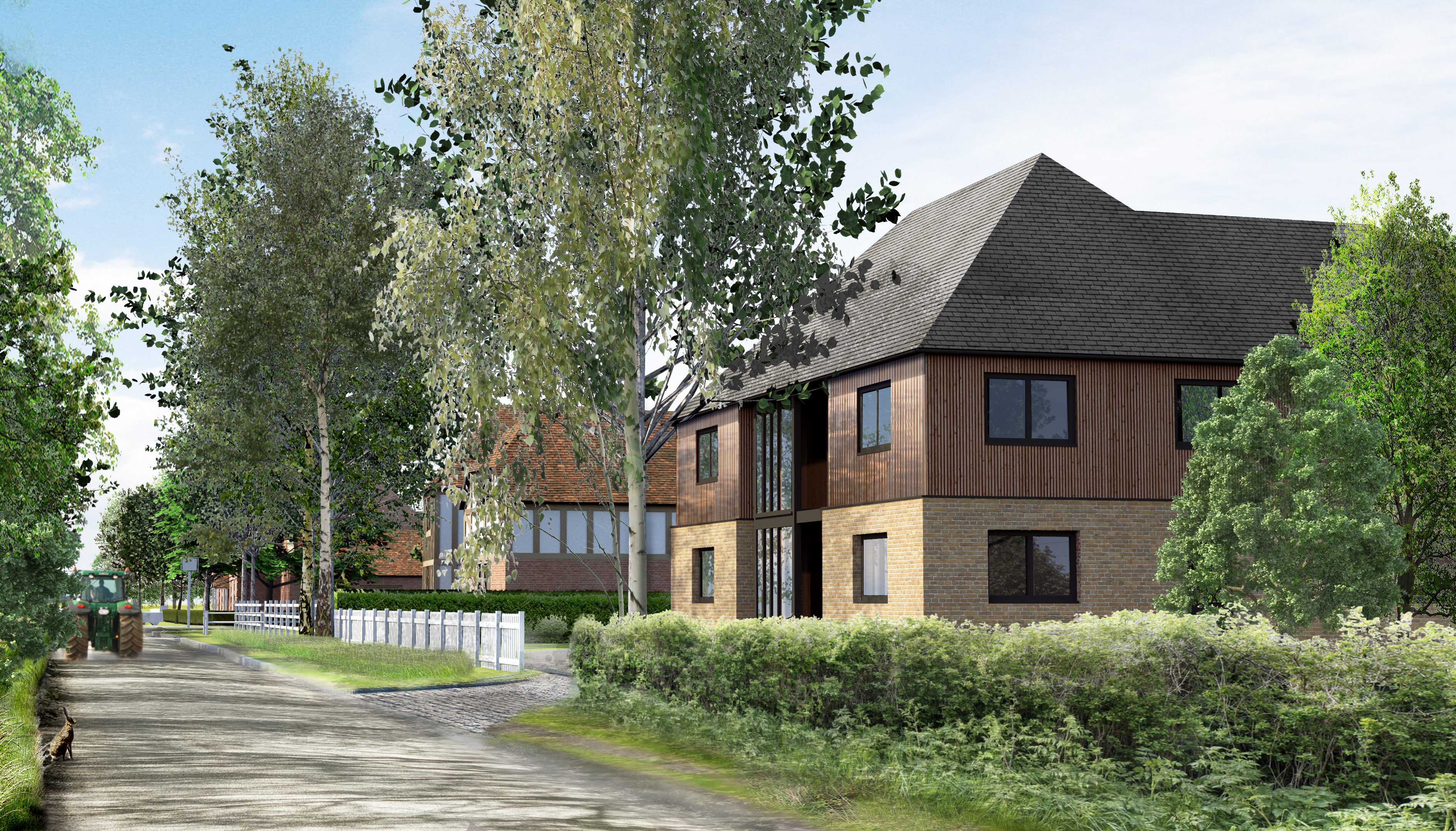 Burnt House Lane frontage of a rural development on brownfield land.    Design: Nick Baldry